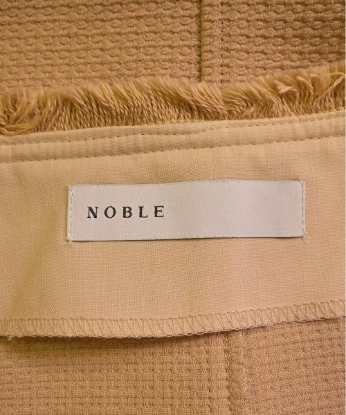 NOBLE Knee length skirts