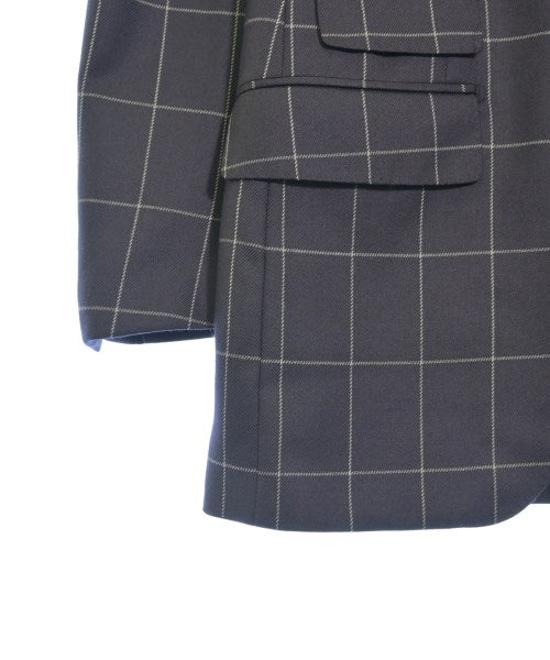 TOMORROWLAND Business suits