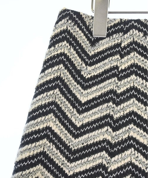 CHANEL Knee length skirts