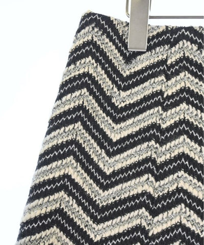 CHANEL Knee length skirts