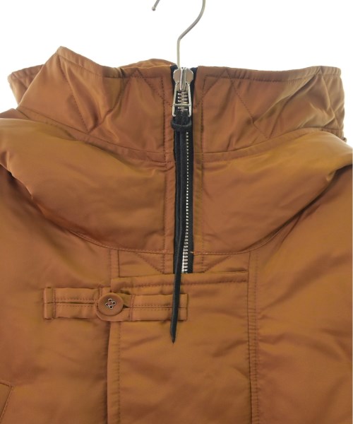 TANAKA Down jackets/Vests